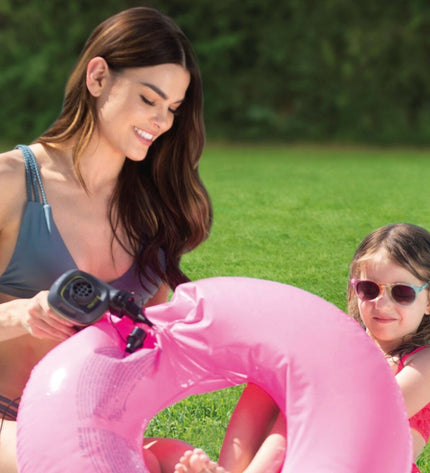 Six Intex Quick Fill electric air pumps for camping and outdoor use, compact and portable for easy inflation.