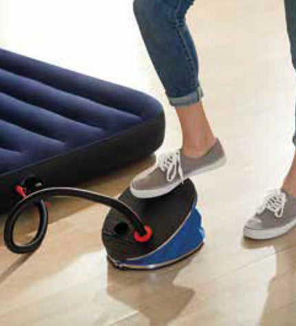 Six Intex foot pumps for outdoor and camping use, ideal for inflating sports and camping gear.