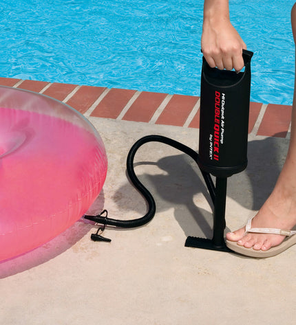 Set of four Intex Double Quick II air pumps for sports, outdoor, camping, and hiking activities, shown in a compact, portable design.