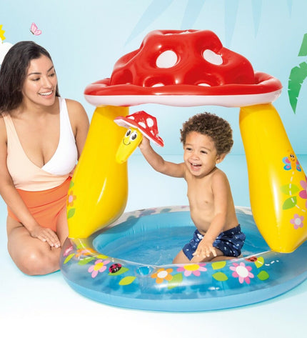 Inflatable children's pool with mushroom sun tent by Intex, set of six, measuring 102x89x102 cm, for outdoor play and cooling.