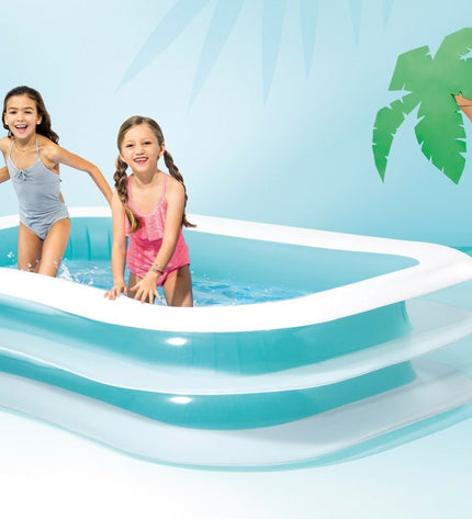 Two Intex inflatable white and green garden pools with dimensions 262x56x175 cm, suitable for outdoor use.