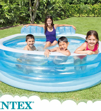 Two blue and white Intex inflatable pool lounge chairs in a garden setting, each measuring 229 x 79 x 218 cm, suitable for relaxations.