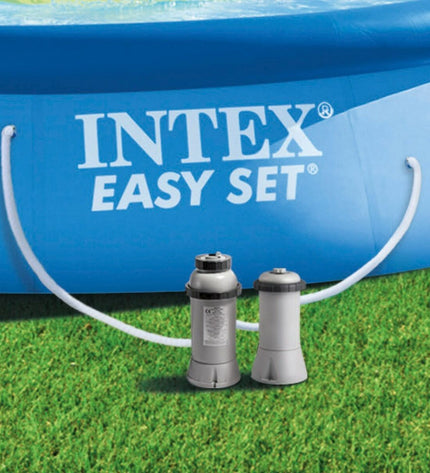 Intex Krystal Clear Pool Basics LED light installed in a backyard swimming pool for ambient lighting.