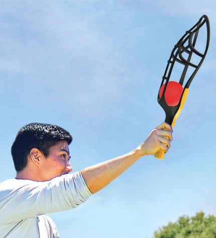 Wham-O racquet set with three lightweight plastic racquets in bright colors, measuring 20 x 55 x 10 cm, for outdoor play.