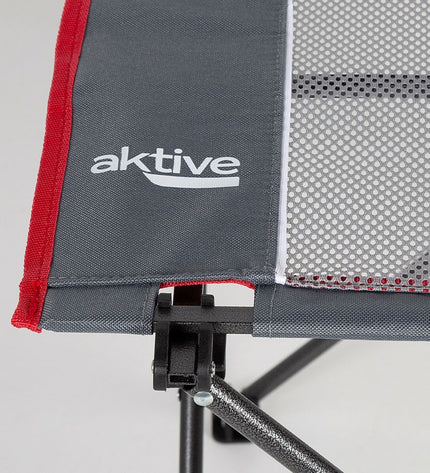 Two gray Aktive camping folding tables, 62x50x50 cm, set up for outdoor camping or hiking activities.