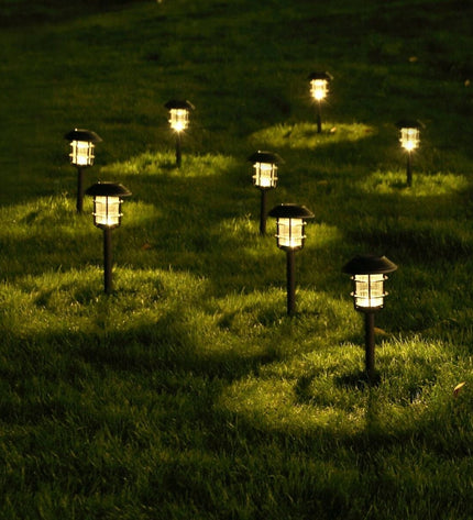 Set solar garden lights from Aktive with stainless steel and plastic, 13x55x13 cm, perfect for outdoor decoration, 4 pieces.