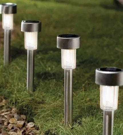 Set of six Aktive solar outdoor garden lights with plastic stakes, each measuring 5.5 x 36 x 5.5 cm, for decorative outdoor lighting.