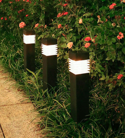 Set of four Aktive solar garden lights with plastic construction, measuring 6 x 39.5 x 6 cm, for outdoor decoration.