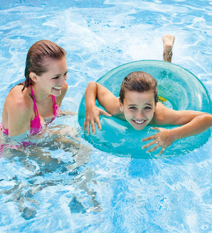 Set of 24 inflatable floating donut pool toys by Intex, 76 x 76 cm, suitable for outdoor water play and pool fun.