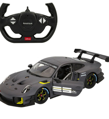 Two Porsche remote-controlled toy cars in red and black, detailed miniature vehicles for play and display.