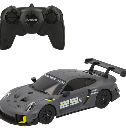 Four Porsche GT2 RS Clubsport remote control toy cars in 1:24 scale, detailed plastic vehicles for play and collection.