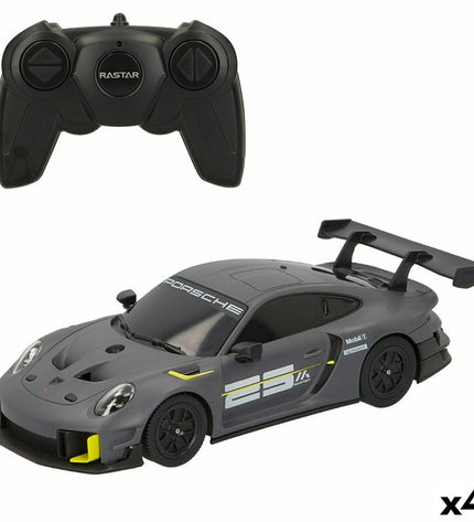 Four Porsche GT2 RS Clubsport remote control toy cars, 1:24 scale, detailed miniature vehicles for play and collection.