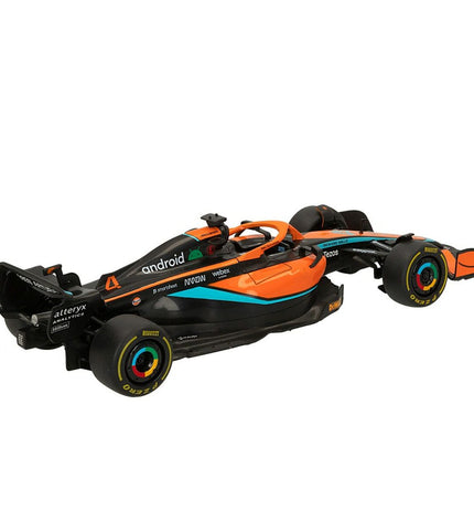 Two McLaren remote control toy cars, detailed miniature vehicles for play, featuring sleek design and vibrant colors.