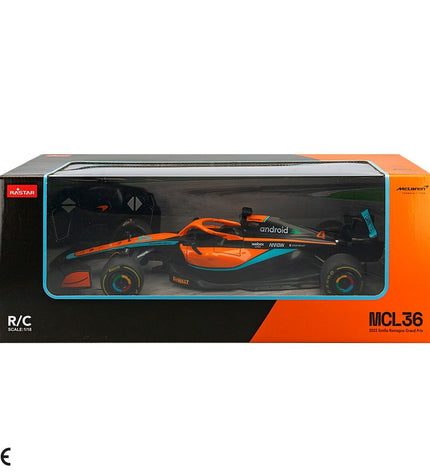 Two McLaren remote control toy cars in red, detailed with sleek design, perfect for play and collection.