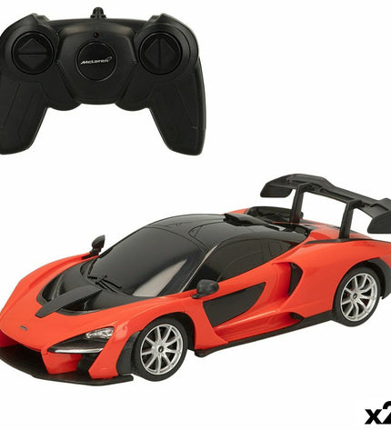 Two McLaren remote control toy cars, sleek design, detailed exterior, set on a neutral background perfect for play or display.