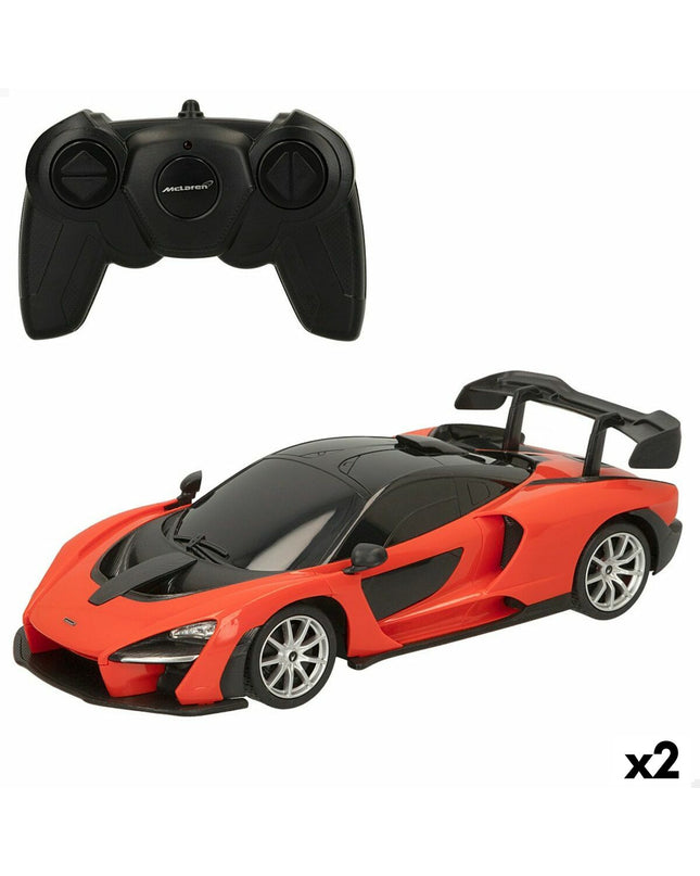 Two McLaren remote control toy cars, sleek design, detailed exterior, set on a neutral background perfect for play or display.