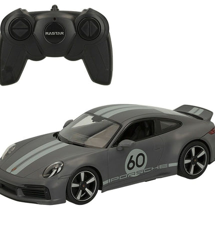 Two Porsche 911 remote control toy cars in 1:16 scale, detailed miniature vehicles for play and collection.