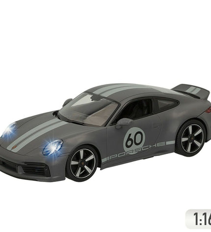 Two Porsche 911 remote control toy cars, 1:16 scale, detailed miniature vehicles for play and collection.