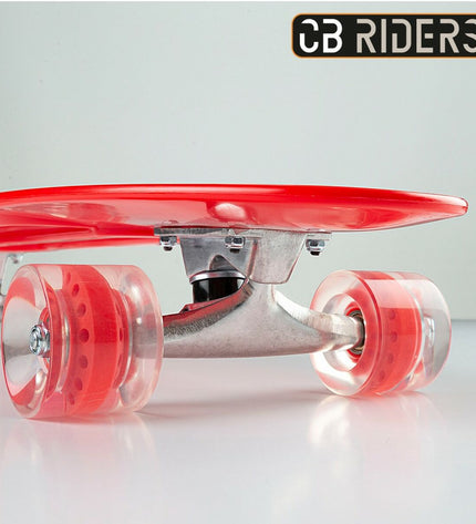 Two Colorbaby red skateboards for kids, featuring colorful decks and sturdy wheels, ideal for outdoor play and sports activities.