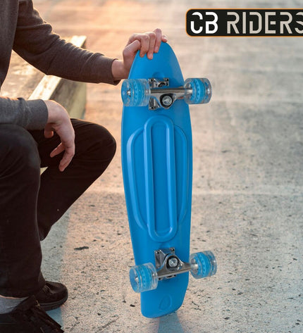 Pair of Colorbaby blue skateboards for children, suitable for outdoor play and sports activities, with colorful deck designs.