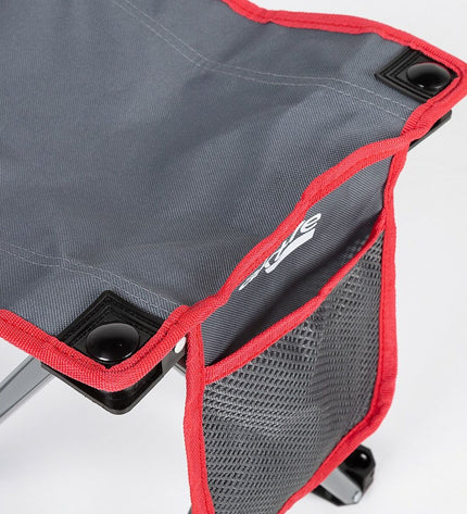 Set of four grey Kruk Aktive foldable camping stools, lightweight and compact for outdoor camping and hiking.