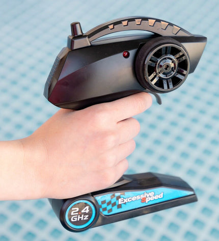 Pair of Colorbaby remote-controlled toy boats in vibrant colors, designed for playful water adventures.