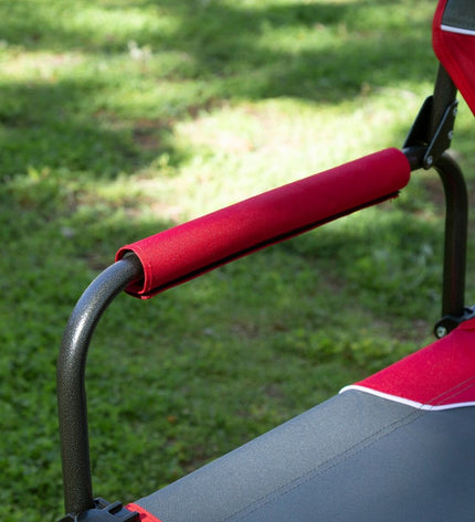 Pair of Aktive foldable camping chairs with black frames and fabric seats, compactly folded for outdoor camping and hiking.