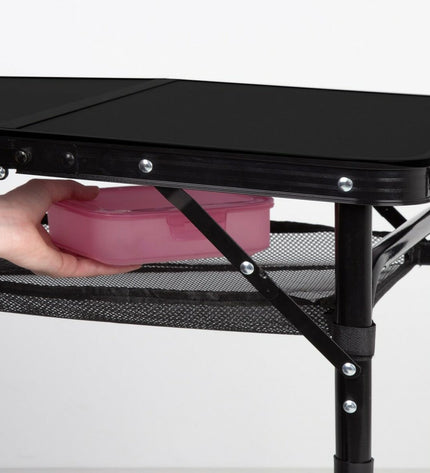Two Aktive Vouwtafel Aktive folding tables for outdoor camping and hiking, lightweight and portable for outdoor activities.