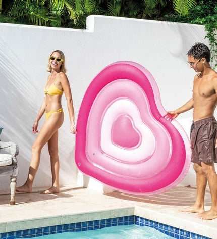 Six pink Intex inflatable mattresses, 135x155x25 cm, suitable for toys, games, outdoor activities, and sports.