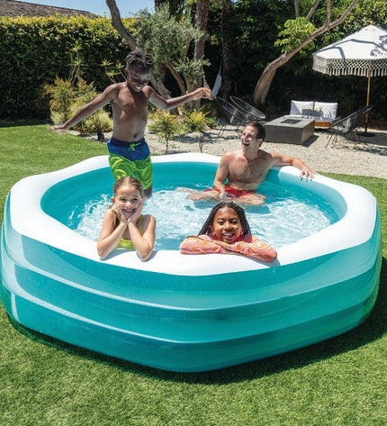 Two Intex inflatable swimming pools, 254x56x254 cm, suitable for garden use, with clear view of the blue pools deflated or inflated.