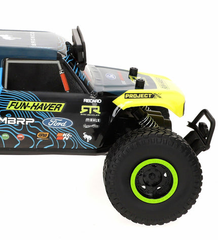 Two Maisto remote control police cars, 35x16x20 cm, detailed toy vehicles for play and collection.