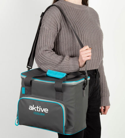 Four Aktive 20L black polyester cooler boxes with PEVA foam insulation, suitable for outdoor camping and hiking.