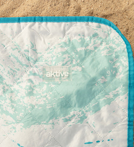 Set of six Aktive PEVA beach towels, 200 x 150 cm, with colorful striped patterns, suitable for home, bath, or beach use.