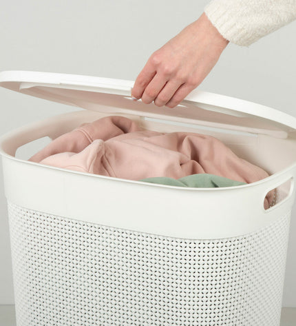 Set of 8 Curver white plastic laundry baskets, 55L capacity, with handles, measuring 44 x 61 x 35 cm, for home organization.