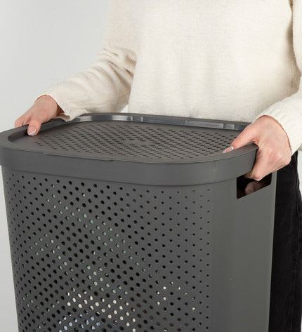 Six gray Curver Infinity plastic laundry baskets with handles, measuring 44x60x35 cm, stacked for storage and organization.