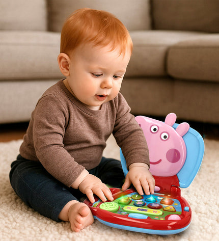 Set of four Peppa Pig electronic toy computers in multicolour, 20x17x14 cm, featuring playful Peppa Pig design for kids.