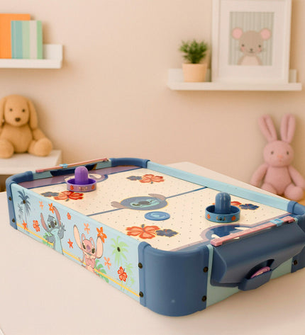 Stitch brand hockey table set with two small wooden hockey sticks and puck, suitable for children's games and toys.
