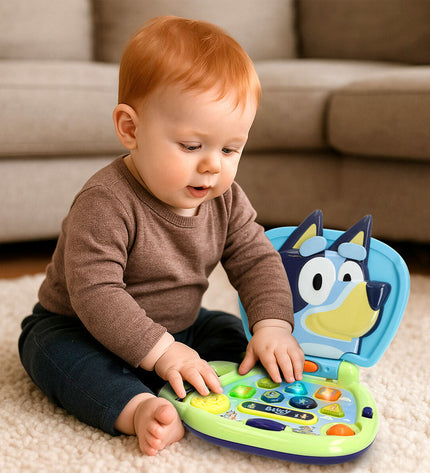 Bluey electronic toy computer set with four blue and pink kids' toys, measuring 20 x 17 x 14 cm, designed for play and learning.
