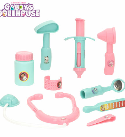 Gabby's Dollhouse toy doctor kit with accessories, includes four pieces for pretend play and role-playing fun.