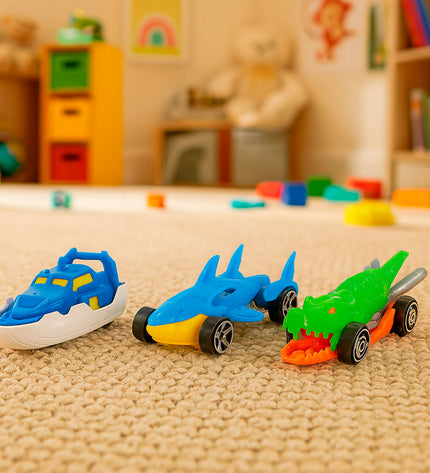 Teamsterz Haai vehicle toy set with three colorful plastic cars in a playful design for kids.