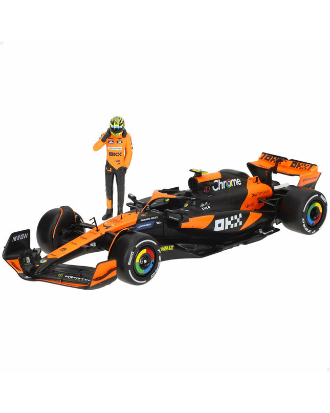 Set of four McLaren F1 2024 toy cars, detailed miniature vehicles from the McLaren brand for play and collection.