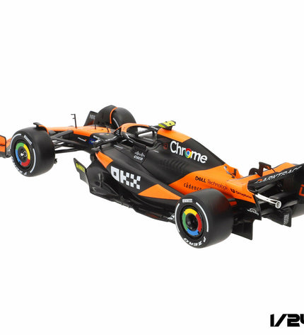 Set of four McLaren F1 2024 toy cars, detailed miniature vehicles from the McLaren brand, perfect for play and collection.