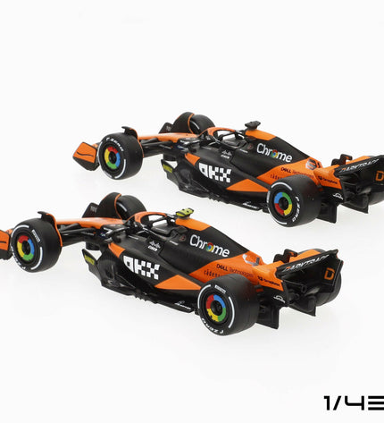 Six McLaren F1 2024 toy cars, detailed miniature vehicles from the McLaren brand in vibrant colors.