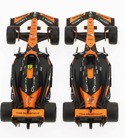 Set of six McLaren F1 2024 toy cars, detailed miniature racing vehicles for play and collection.