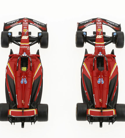Six Ferrari F1 2024 toy cars, miniature model vehicles from Ferrari, displayed together on a surface.