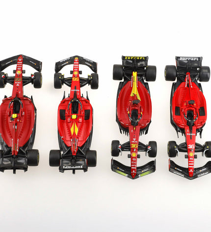 Four Ferrari Leclerc toy cars, detailed miniature vehicles for play, featuring red design and authentic Ferrari branding.