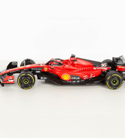 Two Ferrari F1 2023 remote control police cars, 1:10 scale, detailed toy vehicles with red paint and police markings.