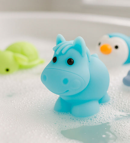 Set of four Winfun animal bath toys, colorful plastic creatures measuring 6x4.5x8 cm, designed for kids' bath time fun.