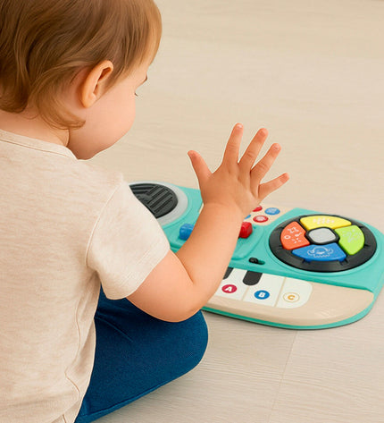 Set of four PlayGo musical baby toys, colorful plastic instruments measuring 31x4x17 cm, designed for young children’s play.