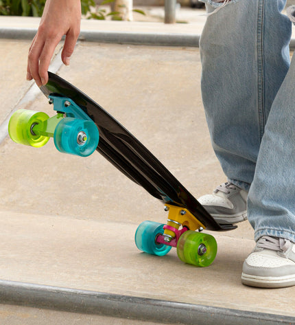Four EVO skateboard toys, colorful plastic skateboards for kids, designed for outdoor play and sports activities.